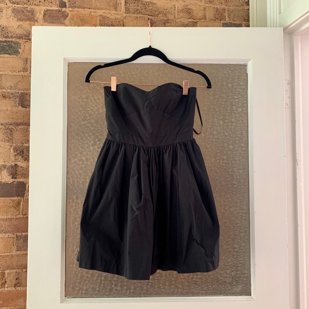 New Years Eve BCBGeneration black strapless mini dress